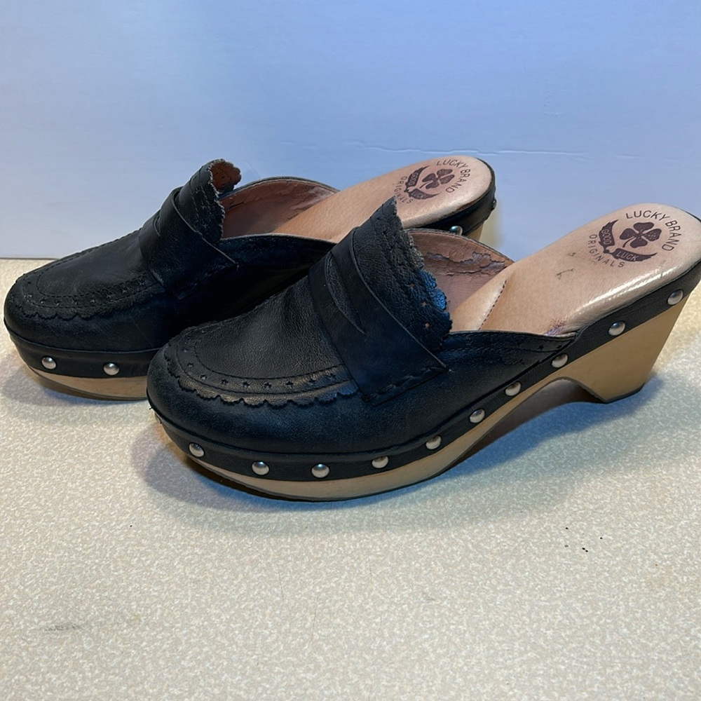 LUCKY BRAND Black leather penny loafer style wooden clogs.
